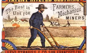 En bonde plöjer åkern i slitstarka kläder, en del av jeans historia. Levi Strauss & Co. San Francisco.