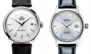 Två eleganta armbandsur: en vit urtavla med datum från Orient, en klassisk orient star, och en silverfärgad med solborstat mönster från Seiko.