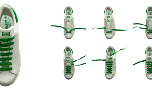 Vita Adidas Stan Smith-skor med gröna skosnören i olika steg av snörning.