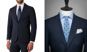 Mörkblå kostym med mönstrad slips. En stilfull kombination för den moderna mannen, oavsett om det är slips eller fluga som gäller.