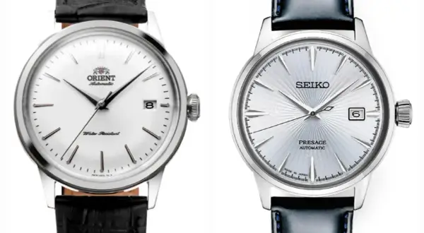 Två eleganta armbandsur: en vit urtavla med datum från Orient, en klassisk orient star, och en silverfärgad med solborstat mönster från Seiko.