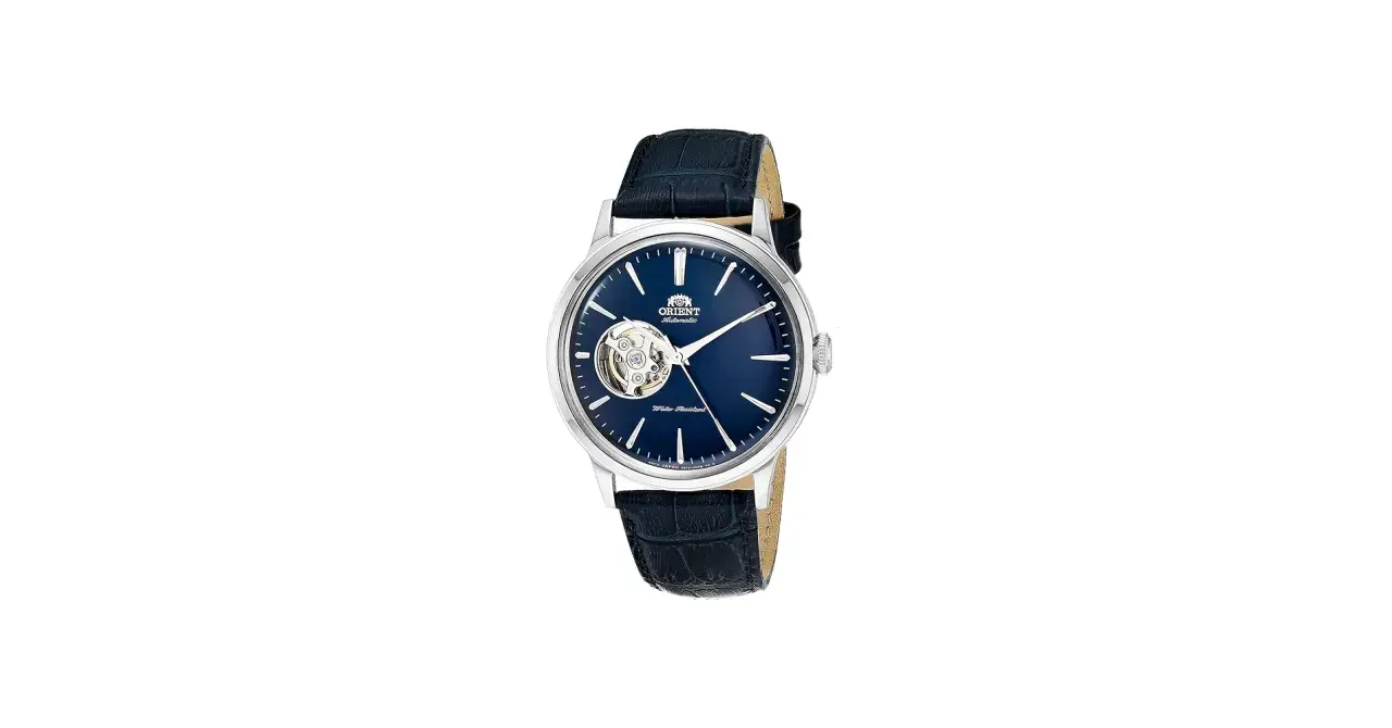 Elegant Orient Bambino Open Heart klocka med blå urtavla och mörkblått läderarmband.