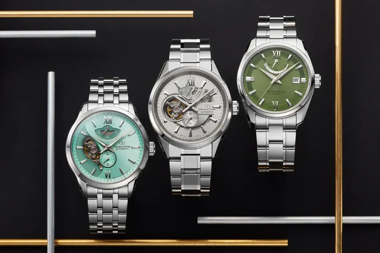 Tre eleganta herrklockor från Orient Star med silverfärgade armband och urtavlor i mintgrönt, silver och grönt.