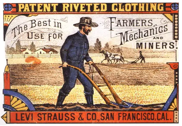 En bonde plöjer åkern i slitstarka kläder, en del av jeans historia. Levi Strauss & Co. San Francisco.